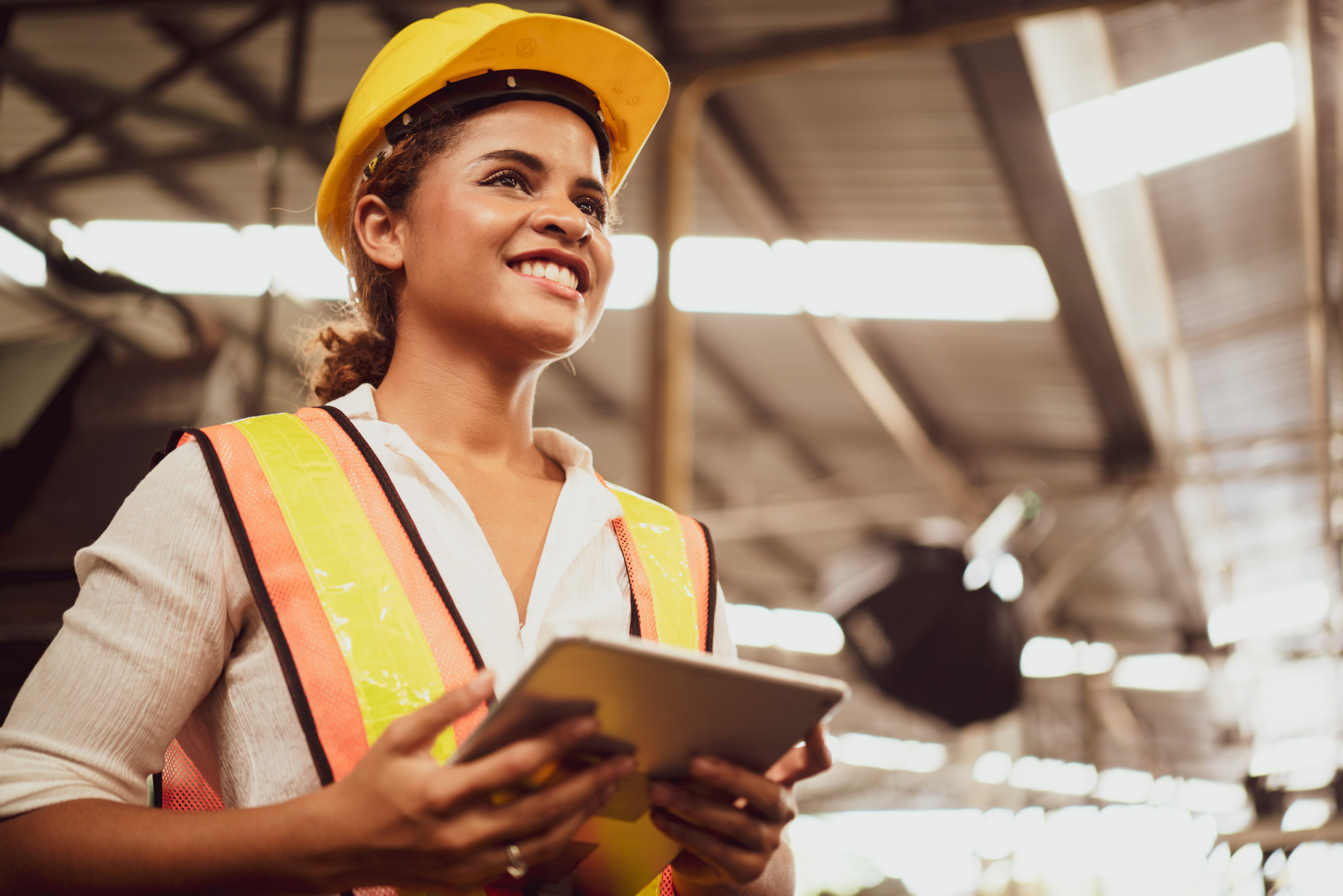 Portrait,Of,An,Industrial,Woman,Worker,Standing,With,A,Big